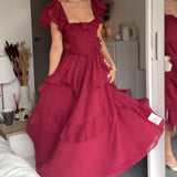 ISABELLA – ROMANTISCHE CASCADE RUFFLE JURK