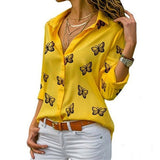 Neleia – Losvallende blouse met vlinderprint