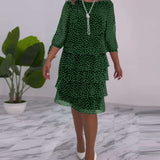 CLARA – ELEGANTE GEDEKTE POLKADOT-JURK