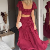 ISABELLA – ROMANTISCHE CASCADE RUFFLE JURK