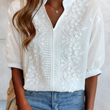 Blouse met V-hals en pofmouwen met kantdecoratie