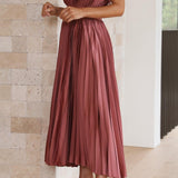 CHARLENE - ELEGANTE GEPLOOIDE MAXI-JURK