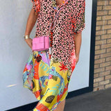 SIENNA – SHIRTJURK MET GEDURFDE PRINTMIX